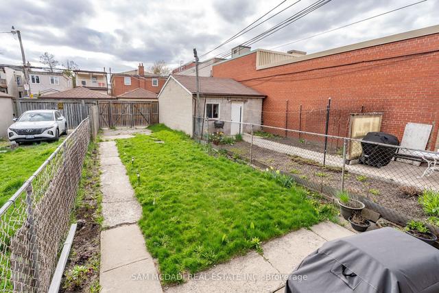 1050 Ossington Ave, House attached with 4 bedrooms, 2 bathrooms and 2 parking in Toronto ON | Image 31