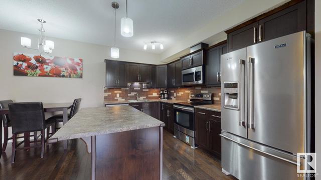 206 - 10530 56 Av Nw, Condo with 2 bedrooms, 2 bathrooms and 2 parking in Edmonton AB | Card Image