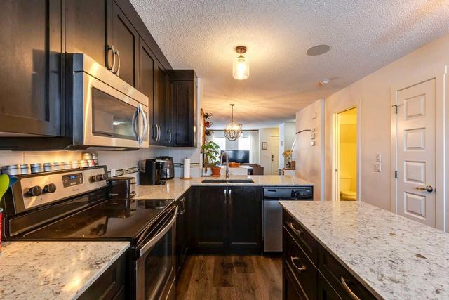 80 Auburn Bay Link Se, Home with 2 bedrooms, 1 bathrooms and 1 parking in Calgary AB | Image 11