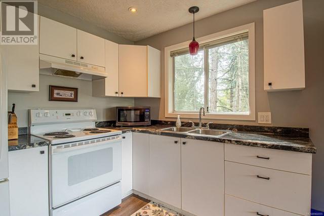 658 Rason Rd, House detached with 5 bedrooms, 4 bathrooms and 5 parking in Langford BC | Image 77