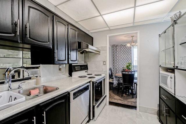 1607 - 11 Wincott Dr, Condo with 3 bedrooms, 2 bathrooms and 1 parking in Toronto ON | Image 7