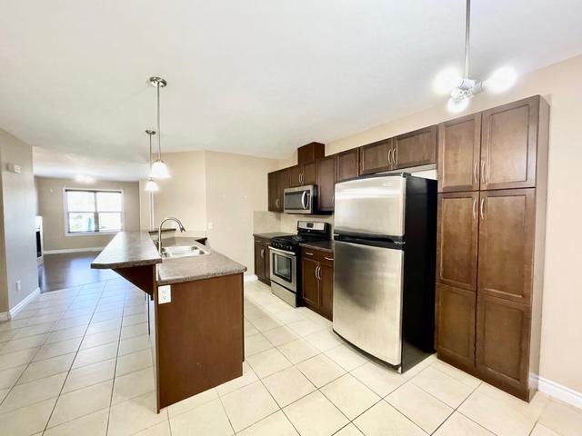 49 - 180 Riverstone Ridge, Home with 3 bedrooms, 3 bathrooms and 3 parking in Wood Buffalo AB | Image 9