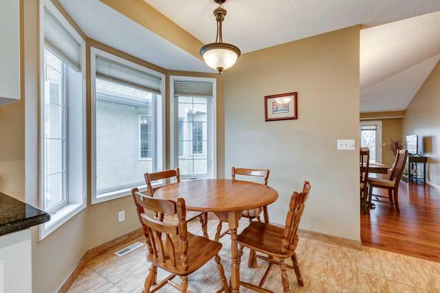 133 Sienna Park Green Sw, Home with 3 bedrooms, 2 bathrooms and 4 parking in Calgary AB | Image 7