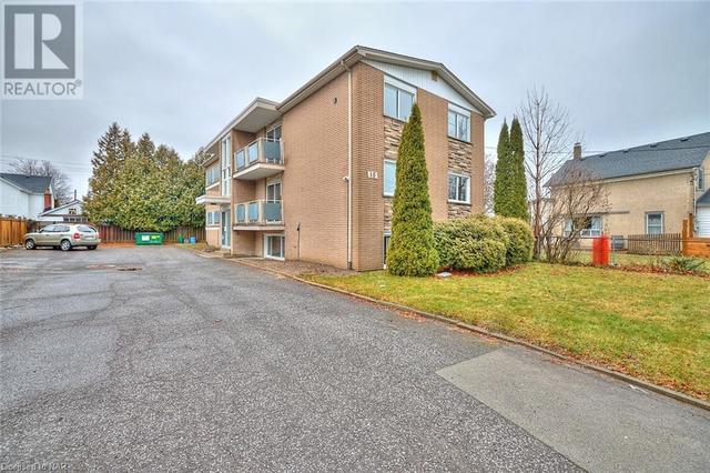 1 - 15 John Street, Condo with 1 bedrooms, 1 bathrooms and 1 parking in St. Catharines ON | Image 1