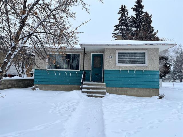 311 18 Street N, House detached with 3 bedrooms, 1 bathrooms and 1 parking in Lethbridge AB | Image 1