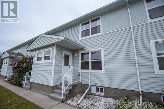 13 Poplar Crescent, House attached with 2 bedrooms, 2 bathrooms and 1 parking in Red Deer County AB | Card Image