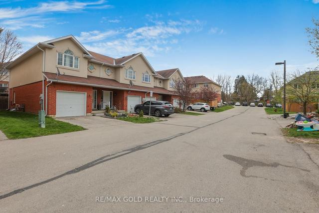 71 - 20 Mcconkey Cres, House attached with 3 bedrooms, 4 bathrooms and 2 parking in Brantford ON | Image 23