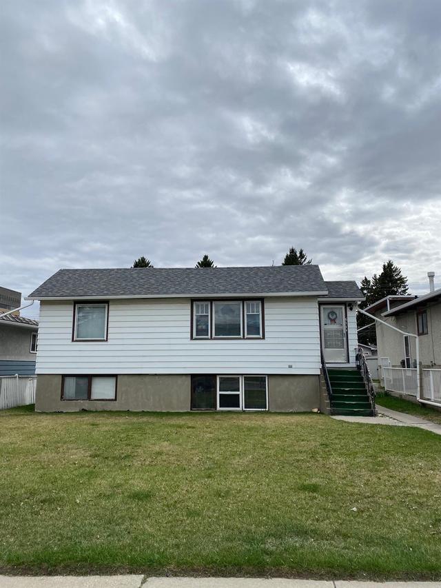 611 68 Avenue Sw, House detached with 4 bedrooms, 2 bathrooms and null parking in Calgary AB | Card Image