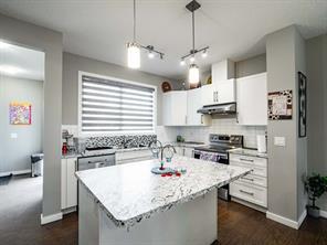 179 Redstone Grove Ne, Home with 3 bedrooms, 3 bathrooms and 4 parking in Calgary AB | Image 4
