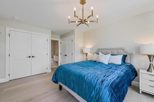 151 Sienna Park Green Sw, Home with 2 bedrooms, 2 bathrooms and 4 parking in Calgary AB | Image 16