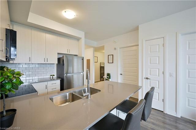 318 - 1105 Leger Way, House attached with 1 bedrooms, 1 bathrooms and 1 parking in Milton ON | Image 11