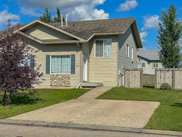 12017 102b Street, Home with 3 bedrooms, 1 bathrooms and 4 parking in Grande Prairie AB | Image 1