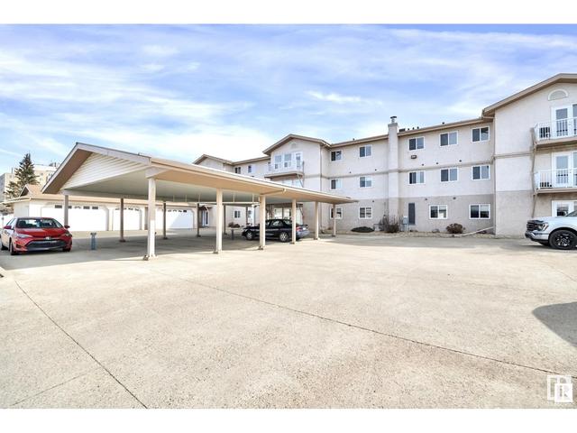 206 - 4604 48a St, Condo with 2 bedrooms, 1 bathrooms and null parking in Leduc AB | Image 37