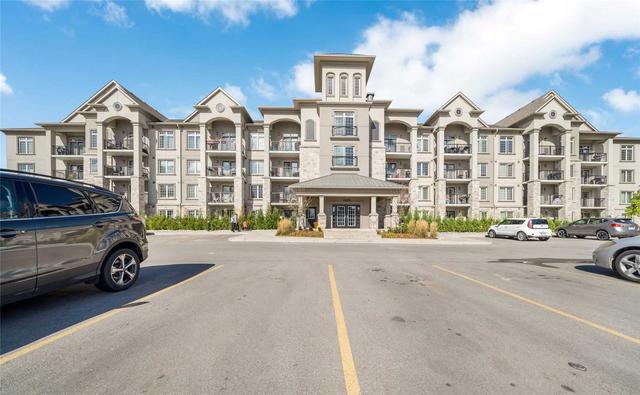 301 - 1460 Main St E, Condo with 2 bedrooms, 2 bathrooms and 1 parking in Milton ON | Image 1