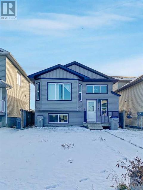 11547 75 Avenue, Home with 5 bedrooms, 3 bathrooms and 3 parking in Grande Prairie AB | Card Image