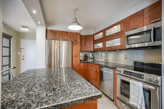 409 - 11 Neilson Dr, Condo with 3 bedrooms, 2 bathrooms and 1 parking in Toronto ON | Image 1