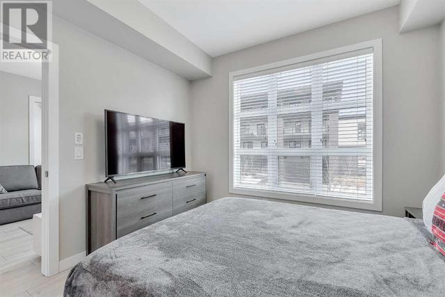 205, - 383 Smith Street Nw, Condo with 2 bedrooms, 2 bathrooms and 1 parking in Calgary AB | Image 13