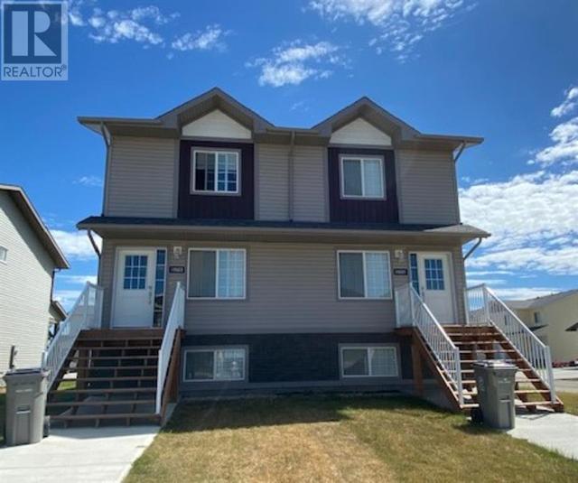 10601 114c Street, House semidetached with 2 bedrooms, 1 bathrooms and 3 parking in Grande Prairie AB | Card Image