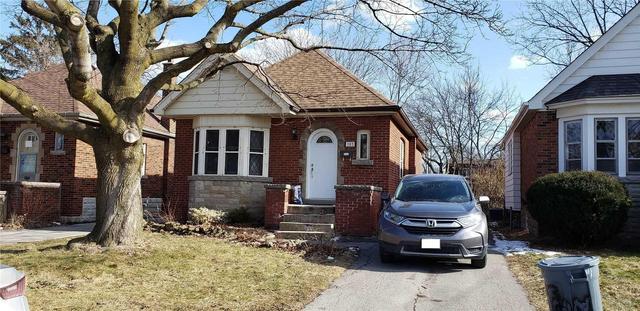 103 Haddon Ave S, House detached with 2 bedrooms, 2 bathrooms and 4 parking in Hamilton ON | Image 1