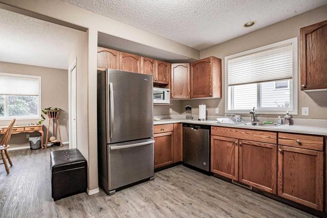 9011 64 Avenue, Home with 4 bedrooms, 2 bathrooms and 2 parking in Grande Prairie AB | Image 13