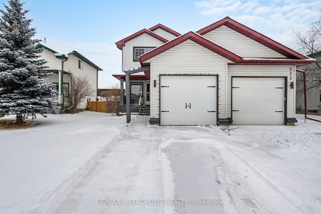 224 Quigley Dr, House semidetached with 3 bedrooms, 3 bathrooms and 2 parking in Cochrane AB | Image 1