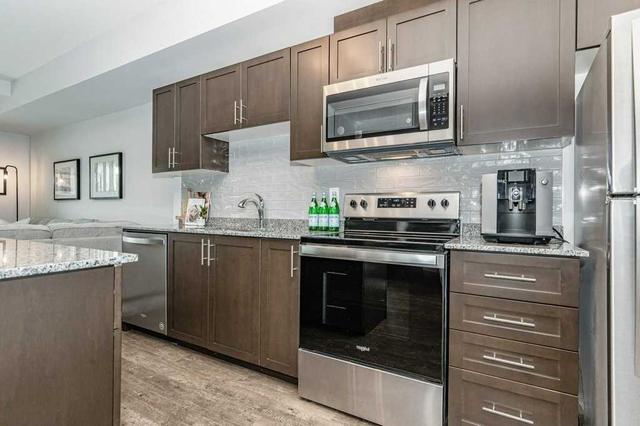 308 - 35 Kingsbury Sq, Condo with 2 bedrooms, 2 bathrooms and 1 parking in Guelph ON | Image 7