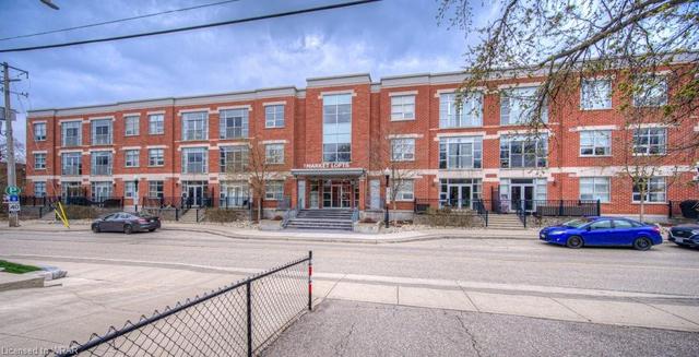 311 - 165 Duke Street E, House attached with 1 bedrooms, 1 bathrooms and 1 parking in Kitchener ON | Image 1