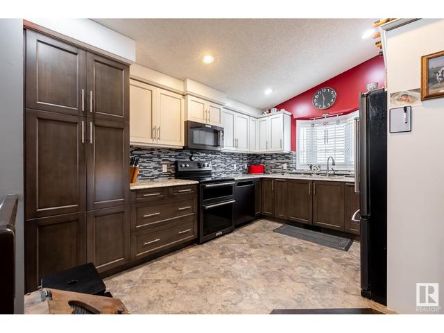 7312 152c Av Nw, House detached with 5 bedrooms, 2 bathrooms and null parking in Edmonton AB | Image 14