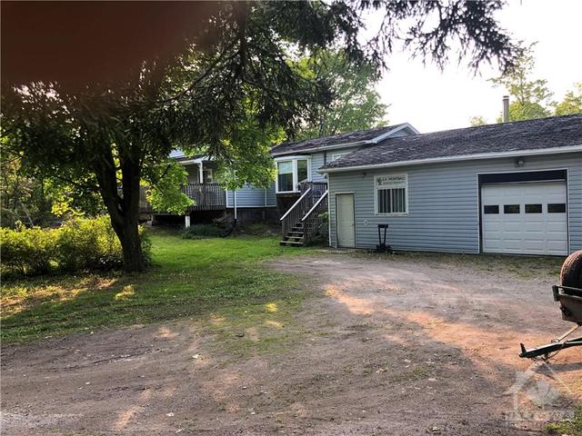 282 Lennon Road, House detached with 2 bedrooms, 1 bathrooms and 6 parking in Rideau Lakes ON | Image 1