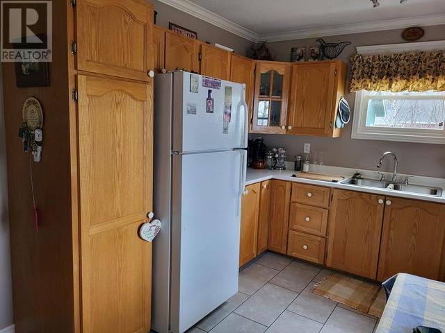 94 Comfort Cove Road, House detached with 2 bedrooms, 1 bathrooms and null parking in Campbellton NL | Image 7