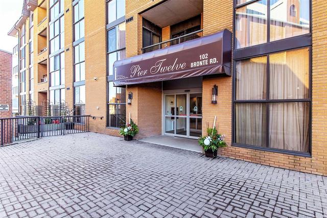 211 - 102 Bronte Rd, Condo with 2 bedrooms, 2 bathrooms and 1 parking in Oakville ON | Image 1