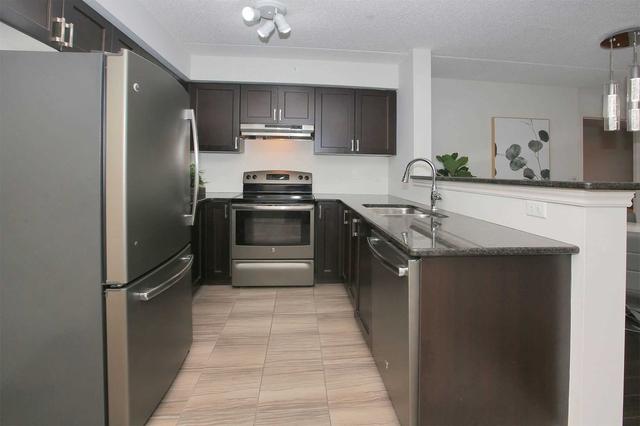 203 - 1470 Main St E, Condo with 2 bedrooms, 1 bathrooms and 2 parking in Milton ON | Image 5