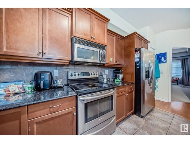101 - 1406 Hodgson Wy Nw, Condo with 2 bedrooms, 2 bathrooms and 2 parking in Edmonton AB | Image 5