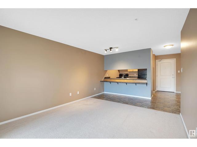 121 - 70 Woodsmere Cl, Condo with 1 bedrooms, 1 bathrooms and null parking in Fort Saskatchewan AB | Image 24