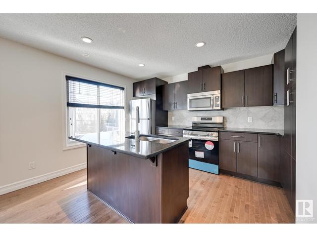87 - 3625 144 Av Nw, House attached with 3 bedrooms, 2 bathrooms and null parking in Edmonton AB | Image 18