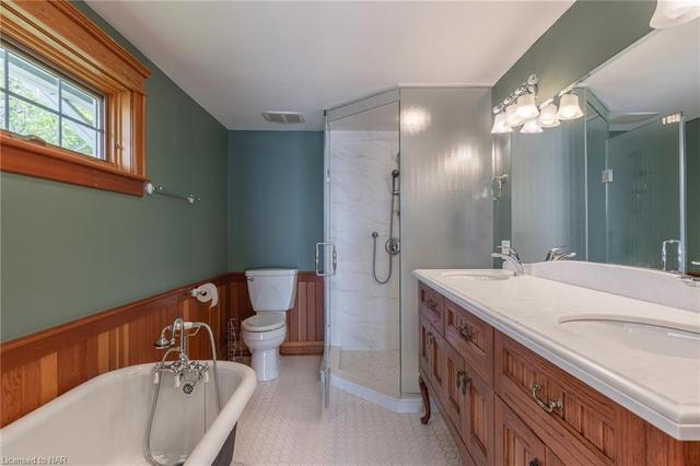 Master ensuite with claw foot tub. | Image 18