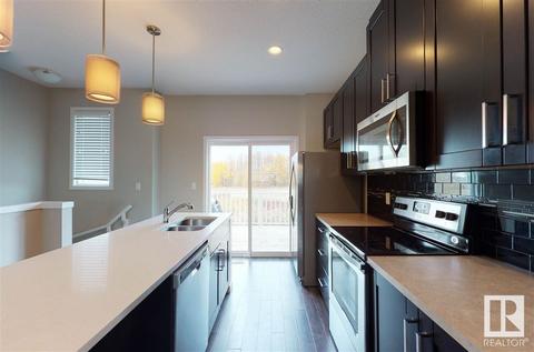 39 - 320 Secord Bv Nw, House attached with 2 bedrooms, 2 bathrooms and null parking in Edmonton AB | Card Image