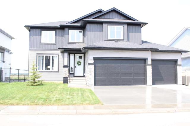 4 Coutts Close, House detached with 3 bedrooms, 2 bathrooms and 3 parking in Olds AB | Image 3