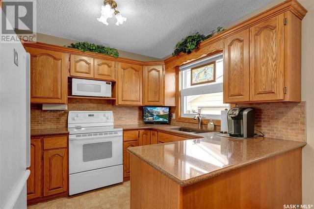14 Catherwood Crescent, House detached with 3 bedrooms, 3 bathrooms and null parking in Regina SK | Image 11