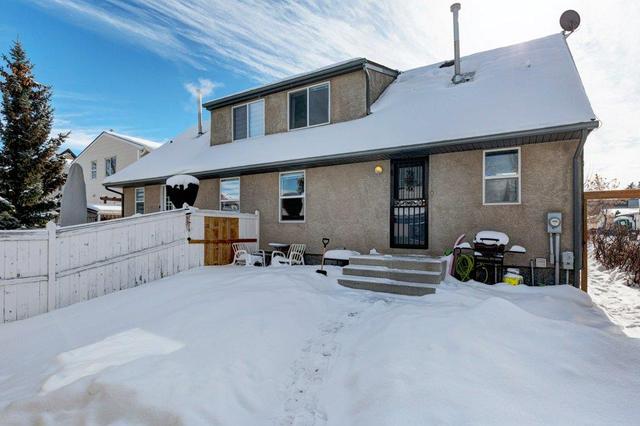 38 Quentin Place Sw, Home with 3 bedrooms, 2 bathrooms and 2 parking in Calgary AB | Image 29
