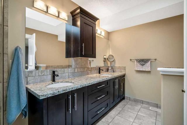 1129 Renfrew Drive Ne, Home with 4 bedrooms, 3 bathrooms and 2 parking in Calgary AB | Image 27