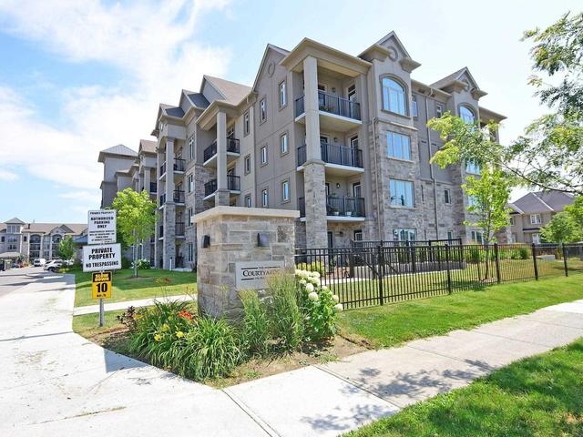 316 - 1450 Main St E, Condo with 2 bedrooms, 2 bathrooms and 1 parking in Milton ON | Image 1