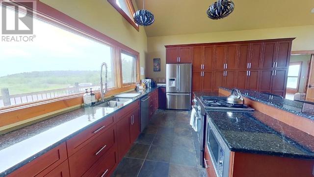 14154 Smith Road, House detached with 4 bedrooms, 3 bathrooms and null parking in Peace River B BC | Image 12