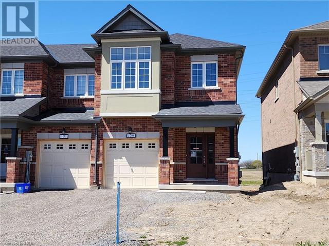 129 Sapphire Way, House attached with 3 bedrooms, 2 bathrooms and 3 parking in Thorold ON | Image 1