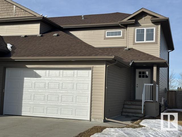 4914 47 St, House semidetached with 3 bedrooms, 2 bathrooms and null parking in Redwater AB | Image 1