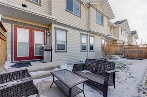 Lots of Greenspace along this Townhouse that has 2 Titled Parking Stalls | Image 25