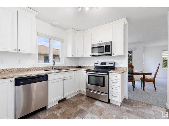 10640 153 Av Nw, House attached with 2 bedrooms, 1 bathrooms and 4 parking in Edmonton AB | Image 8