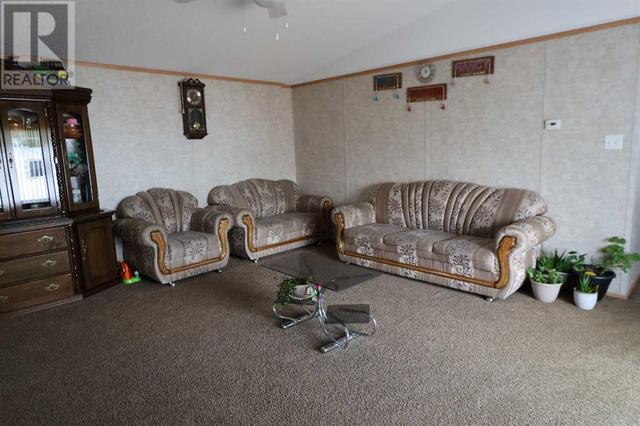 720 2 Street N, House other with 3 bedrooms, 2 bathrooms and 4 parking in Taber MD AB | Image 12