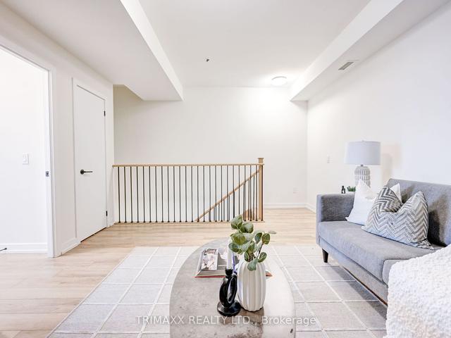102 - 12 Symes Rd, Townhouse with 2 bedrooms, 2 bathrooms and 1 parking in Toronto ON | Image 18