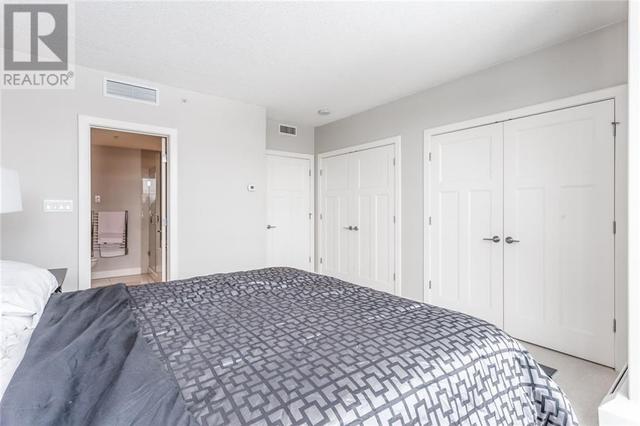 132, - 99 Spruce Place Sw, House attached with 2 bedrooms, 2 bathrooms and 2 parking in Calgary AB | Image 16
